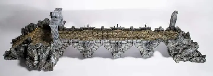 Mines of Maznar Modular Bridge – Top Angled Side View Full view of the 3D printed Mines of Maznar modular bridge, photographed from a top-angled side perspective to show assembled stonework, painted details, and the complete stair and walkway structure for tabletop gaming